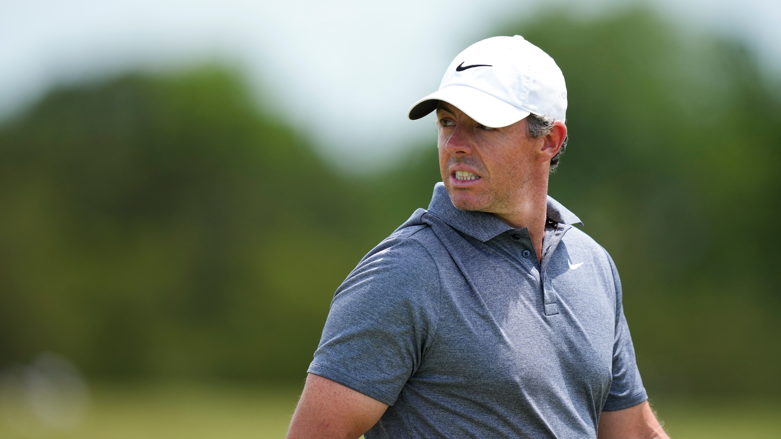 Rory McIlroy reacts to a putt