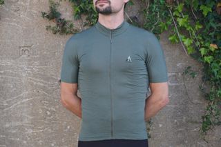 Male cyclist wearing the 7mesh Ashlu Merino gravel cycling jersey