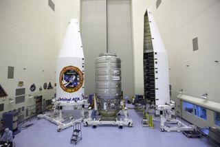 An Orbital ATK Cygnus spacecraft is encapsulated in a payload fairing ahead of a launch atop a United Launch Alliance Atlas V rocket in March 2016.