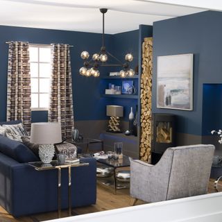 blue living room with log storage