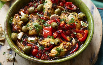 Baked chicken thighs with paprika and peppers