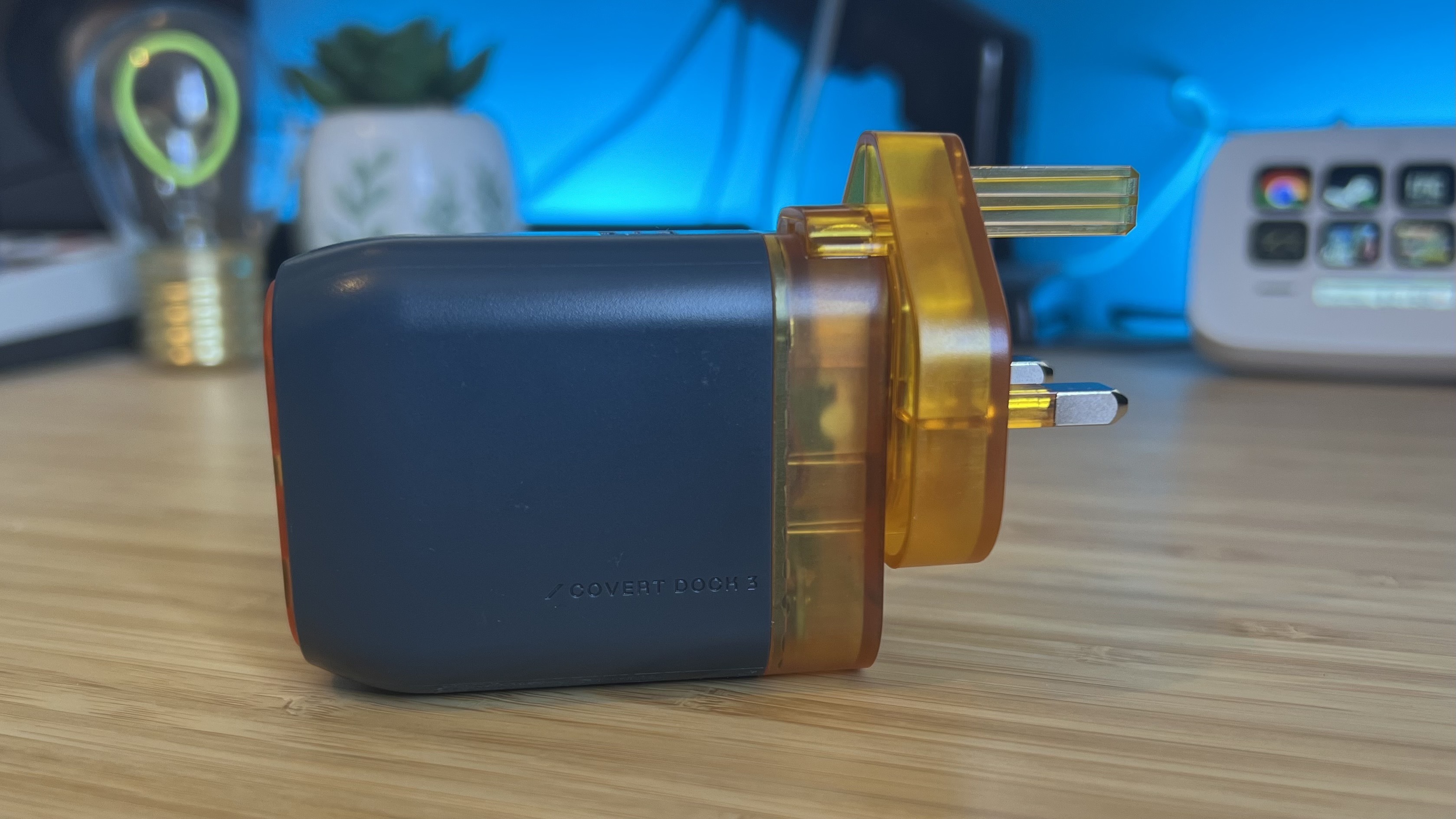 Side view of Genki Covert Dock 3 on a wooden desk