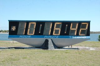 The black with blue trim, 26-foot-long countdown clock at NASA’s Kennedy Space Center press site in Florida displayed the hours, minutes and seconds to a launch using lightbulbs to form digits.