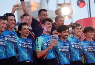 Team DÃ©cathlon-AG2R La Mondiale's Ben O'Connor celebrates with teammates on the podium after the last stage of the Vuelta a Espana, a 24,6 km time-trial race between Madrid and Madrid, on September 8, 2024. (Photo by OSCAR DEL POZO / AFP)