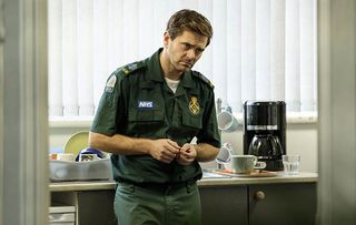 Michael Stevenson as paramedic Iain Dean