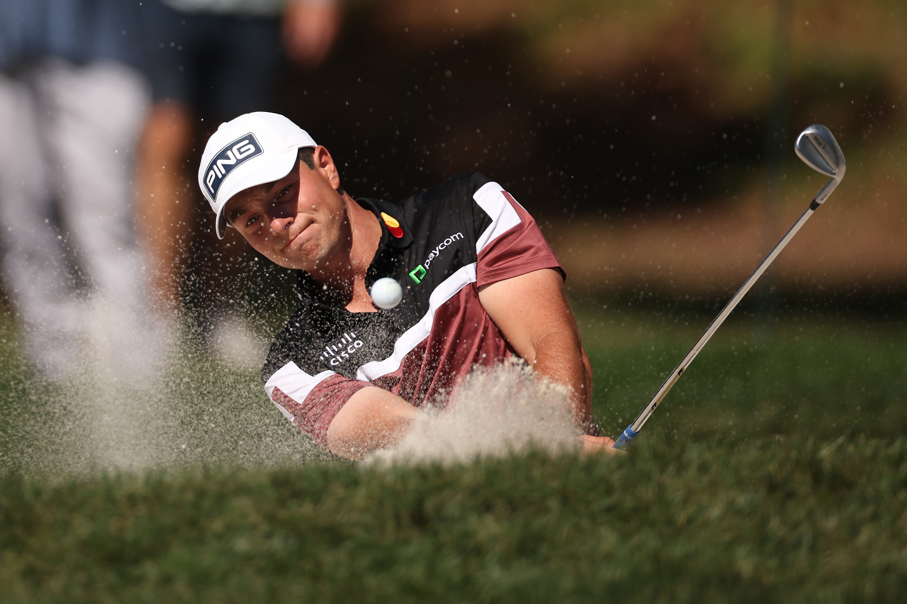 Viktor Hovland hits a bunker shot