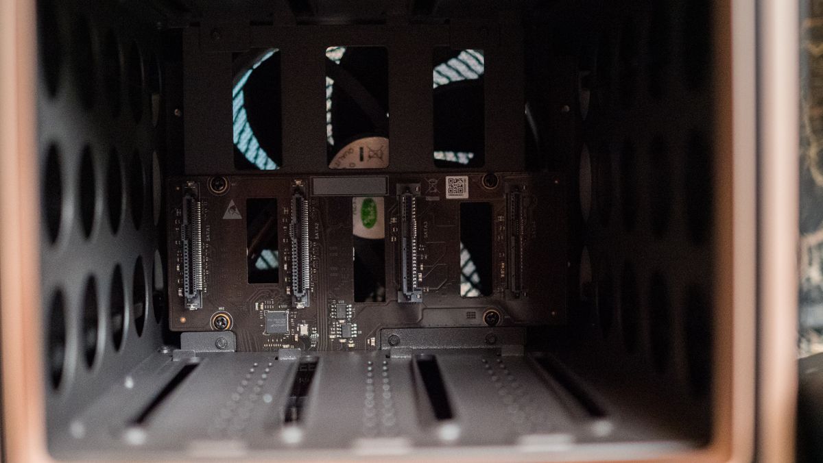 UGREEN DXP4800 GT 4-bay NAS on an IKEA shelf showing the HDD bays