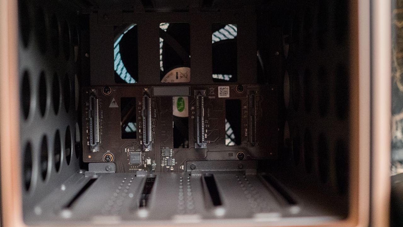 UGREEN DXP4800 GT 4-bay NAS on an IKEA shelf showing the HDD bays