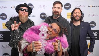 Skindred with their MOBO Award