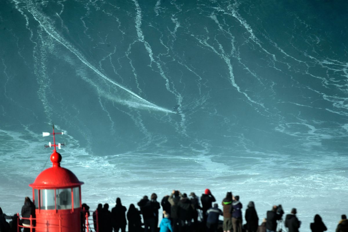 Surfers take on 'mountain' of a wave, The Right, fuelled by huge