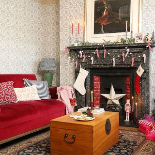 Christmas living room with red velvet sofa