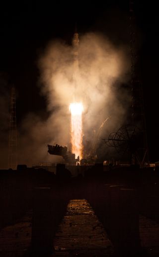 A Russian Soyuz TMA-14M rocket launches from the Baikonur Cosmodrome in Kazakhstan on Friday, Sept. 26, 2014 carrying Expedition 41 Soyuz Commander Alexander Samokutyaev of the Russian Federal Space Agency (Roscosmos), Flight Engineer Barry Wilmore of NAS