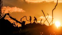 Men walk through rubble at the Bureij camp for Palestinian refugees in the central Gaza Strip on September 14, 2026