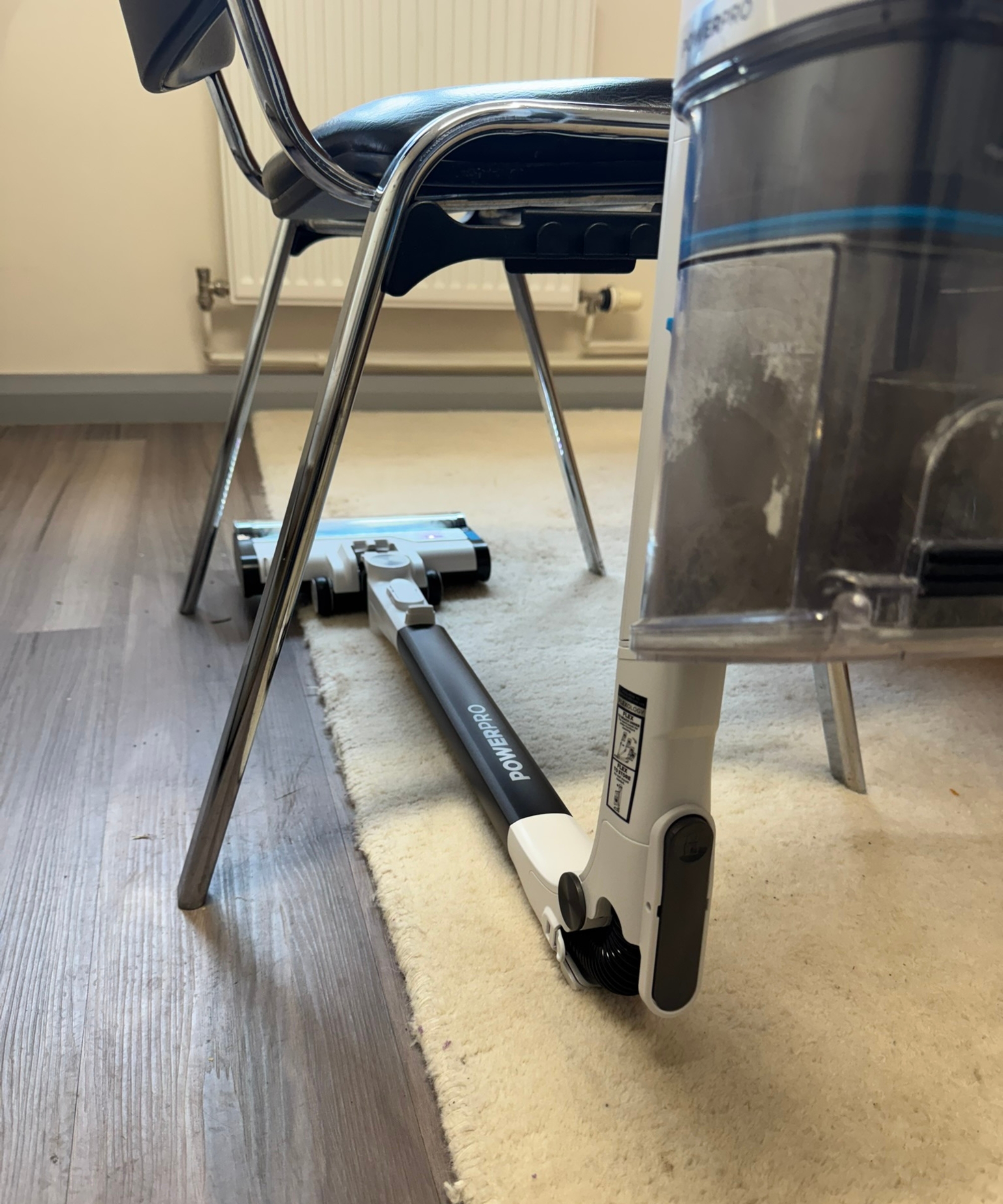 Shark PowerPro Pet vacuuming thick rug using flexible wand in Bristol ARC