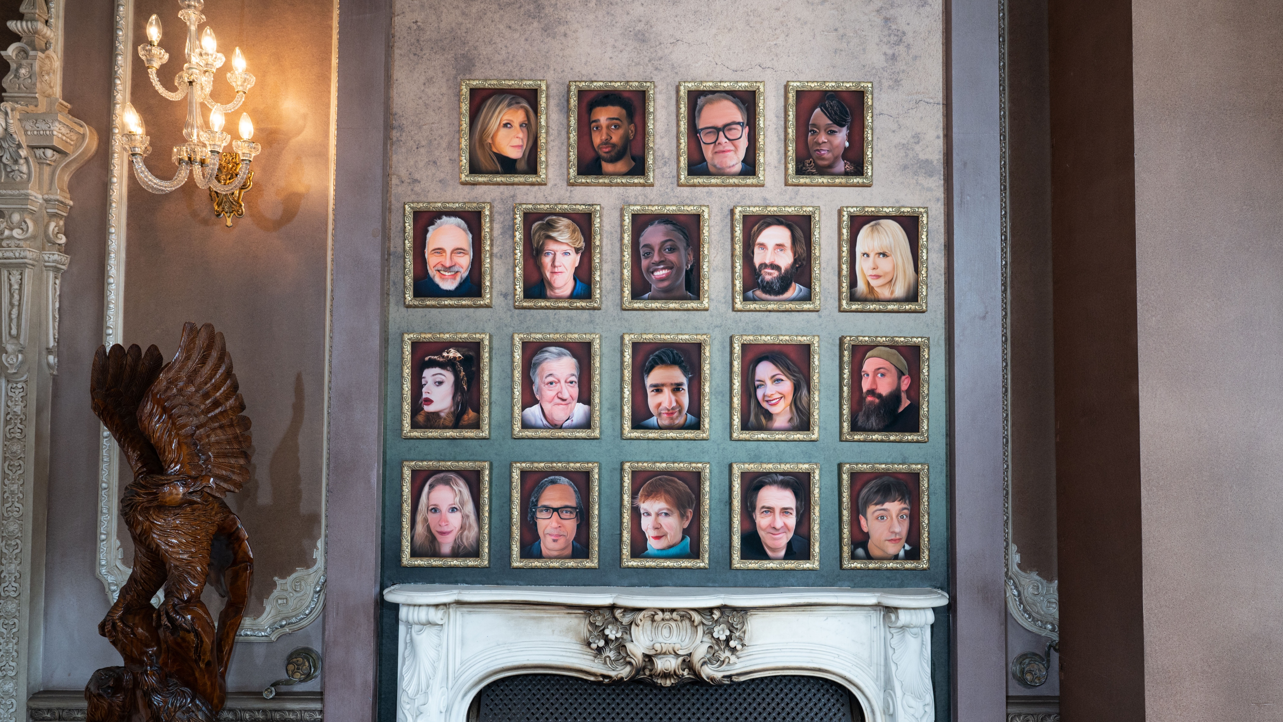 The Celebrity Traitors UK cast photos lined up on the castle wall.