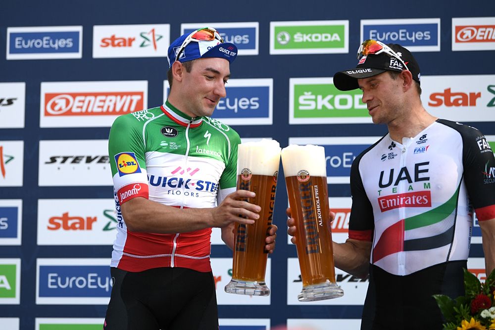 Elia Viviani (Quick-Step Floors) wins EuroEyes Cyclassics Hamburg, cheers with runner-up Alexander Kristoff (UAE Team Emirates)