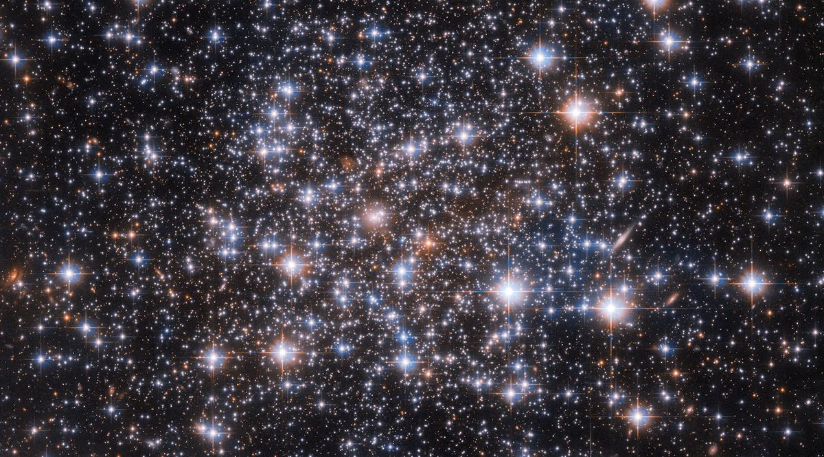 A celestial workhorse and its dedicated team of astronomers are at it again by delivering a hypnotic new image of a globular cluster and its infinite 