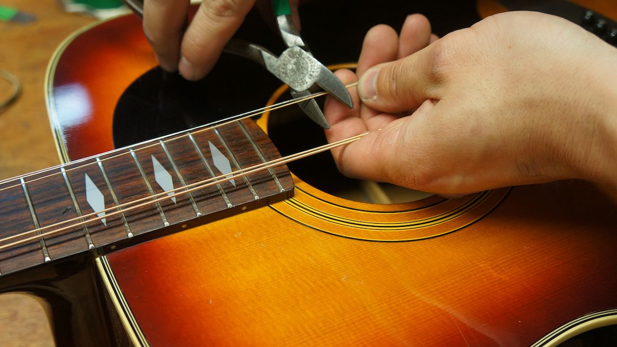 How to restring an acoustic guitar stepbystep guidance from a