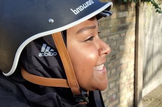 Image shows cyclist wearing Adidas Cycling Hijab