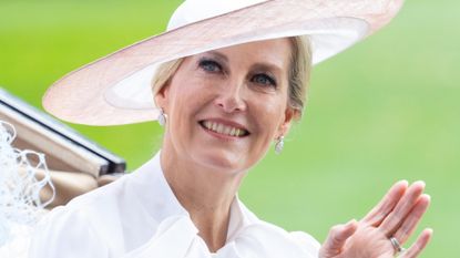 Duchess Sophie wears a white dress and pink hat as she attends day two of Royal Ascot 2023 at Ascot Racecourse on June 21, 2023 in Ascot, England.