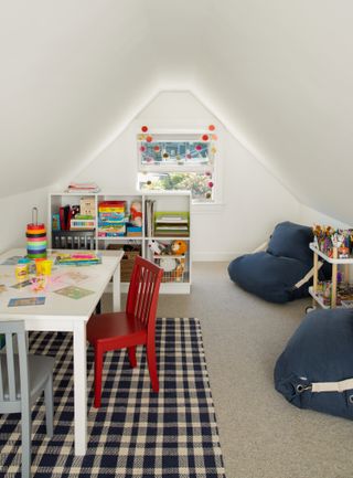 A small playroom with bright toned furniture