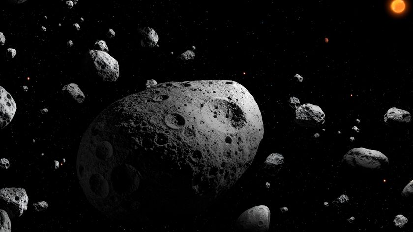 An illustration of a large round asteroid covered in craters surrounded by smaller asteroids with a orange glowing sun in the top left of the image. 