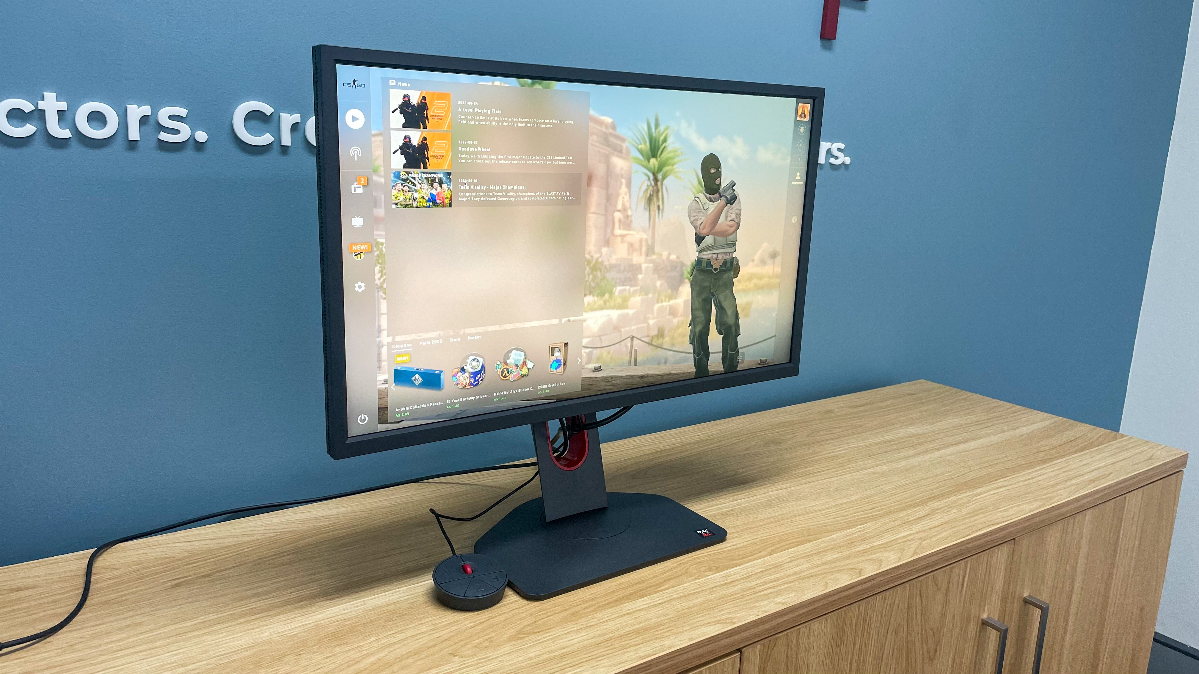 BenQ XL2566K gaming monitor displaying CS GO gaming