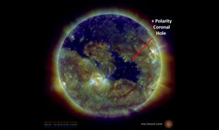 This image of the sun released by NOAA's Space Weather Prediction Center shows the location of a coronal hole on the sun, as viewed by NASA's Solar Dynamics Observatory spacecraft on Oct. 6, 2015. Solar wind streaming from the coronal hole is amplifying auroras on Earth, according to the SWPC.