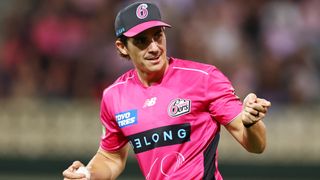 Sean Abbott of the Sixers fumbles a catch and retains to dismiss Beau Webster of the Hurricanes during the BBL Challenger match between Sydney Sixers and Hobart Hurricanes at the Sydney Cricket Ground, on January 23, 2026, in Sydney, Australia