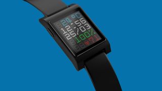 The black Core Time 2 smartwatch in front of a blue background