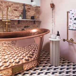 bathroom with copper bathtub and rotten floorboards