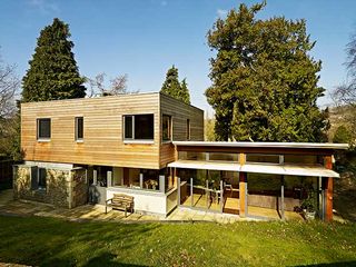 A contemporary cedar-clad home built on a conservation site in the historic city of Bath