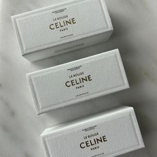 Celine lipsticks on a marble table