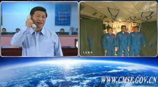 Chinese President Xi Jinping came to the Beijing Aerospace Control Center (BACC) on June 24, 2013, and spoke with the three astronauts aboard the Tiangong-1 orbiter.