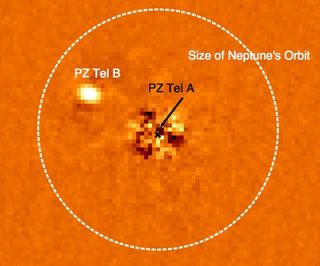 Rare Find: Failed Star Circling Sun-Like Star