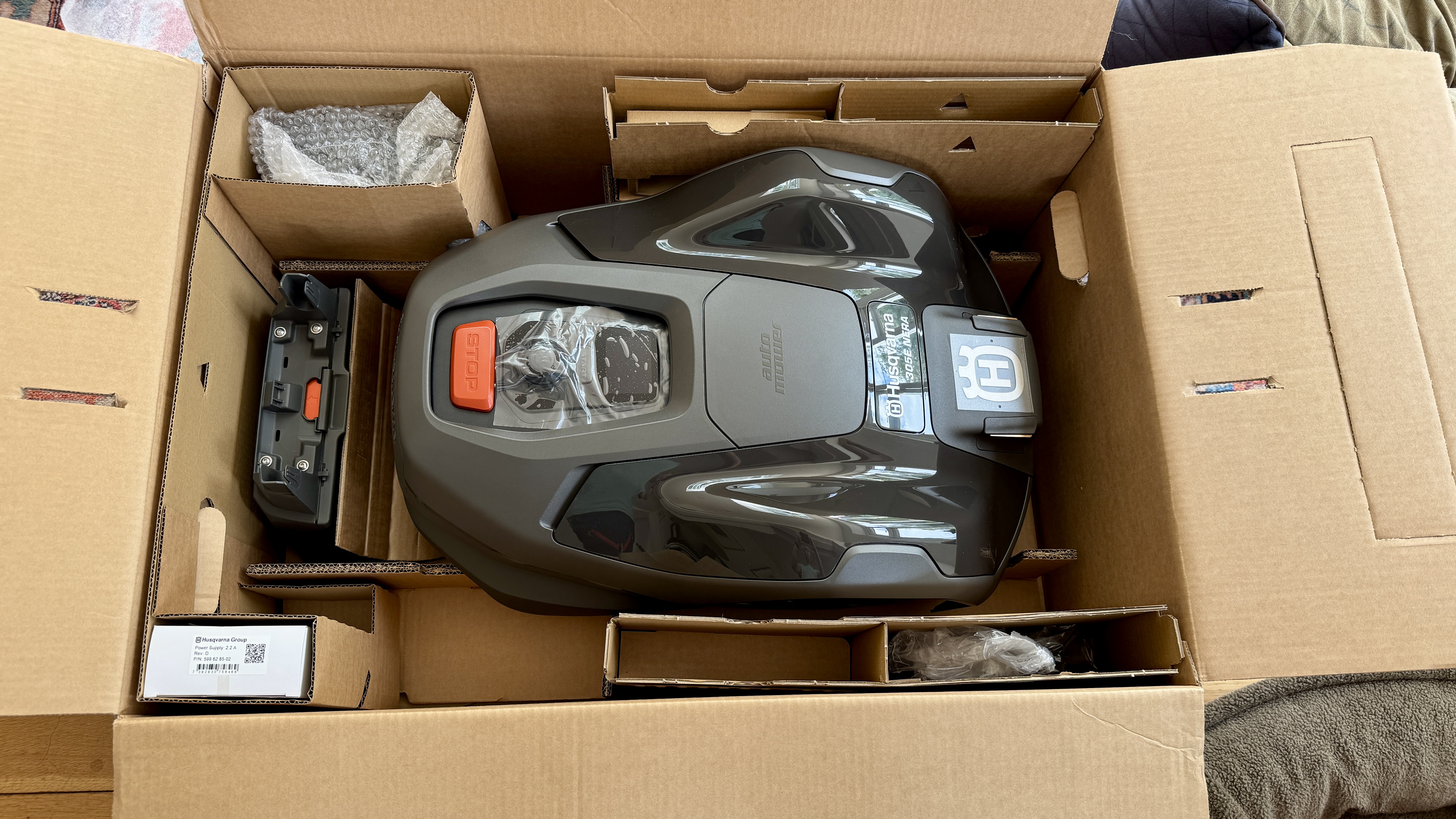 Husqvarna Automower 305E NERA robot mower in its box