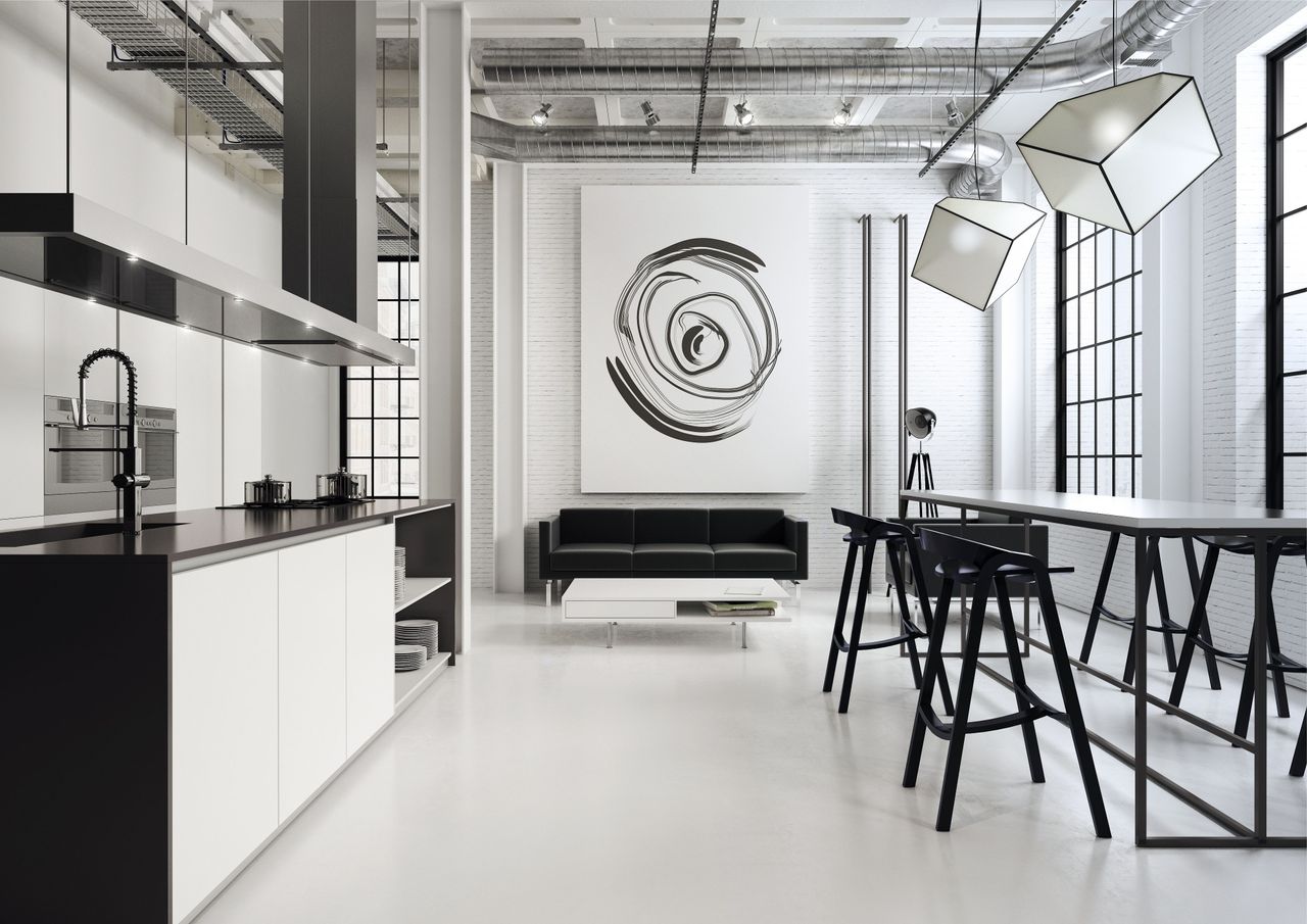 An open plan interior with kitchen, dining room and living room, designed in black and white shades