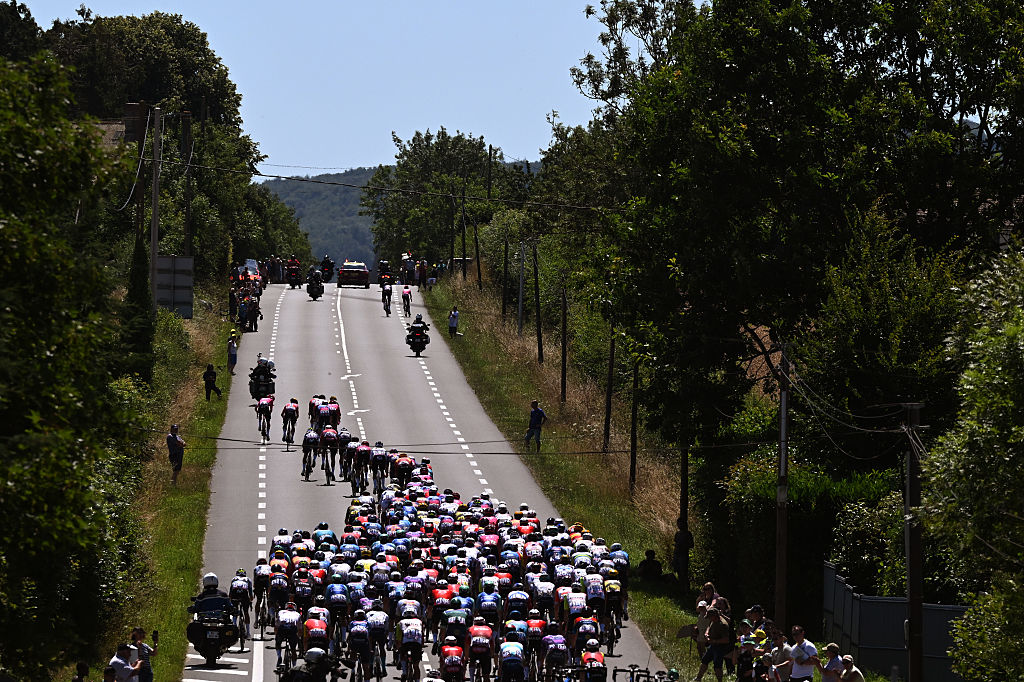 VIRE NORMANDIE, FRANCE - JULY 10: A general view of the peloton passing through a landscape during the 112th Tour de France, Stage 6 a 201.5km stage from Bayeux to Vire Normandie / #UCIWT / on July 10, 2025 in Vire Normandie, France. (Photo by Tim de Waele/Getty Images)