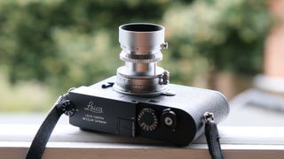 Thypoch Eureka lens attached to a Leica camera
