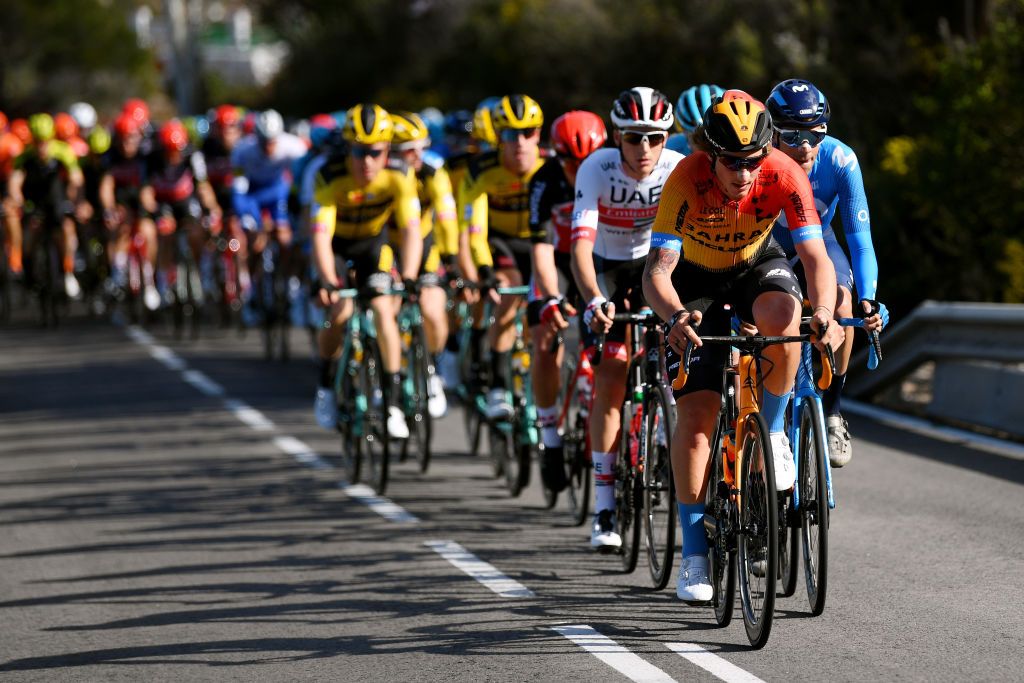 CULLERA SPAIN FEBRUARY 06 Ivan Garcia Cortina of Spain and Team BahrainMclaren Jorge Arcas of Spain and Movistar Team Tadej Pogacar of Slovenia and UAE Team Emirates Peloton during the 71st Volta a la Comunitat Valenciana 2020 Stage 2 a 181km stage from Torrent to Cullera 181m VueltaCV VCV2020 on February 06 2020 in Cullera Spain Photo by David RamosGetty Images