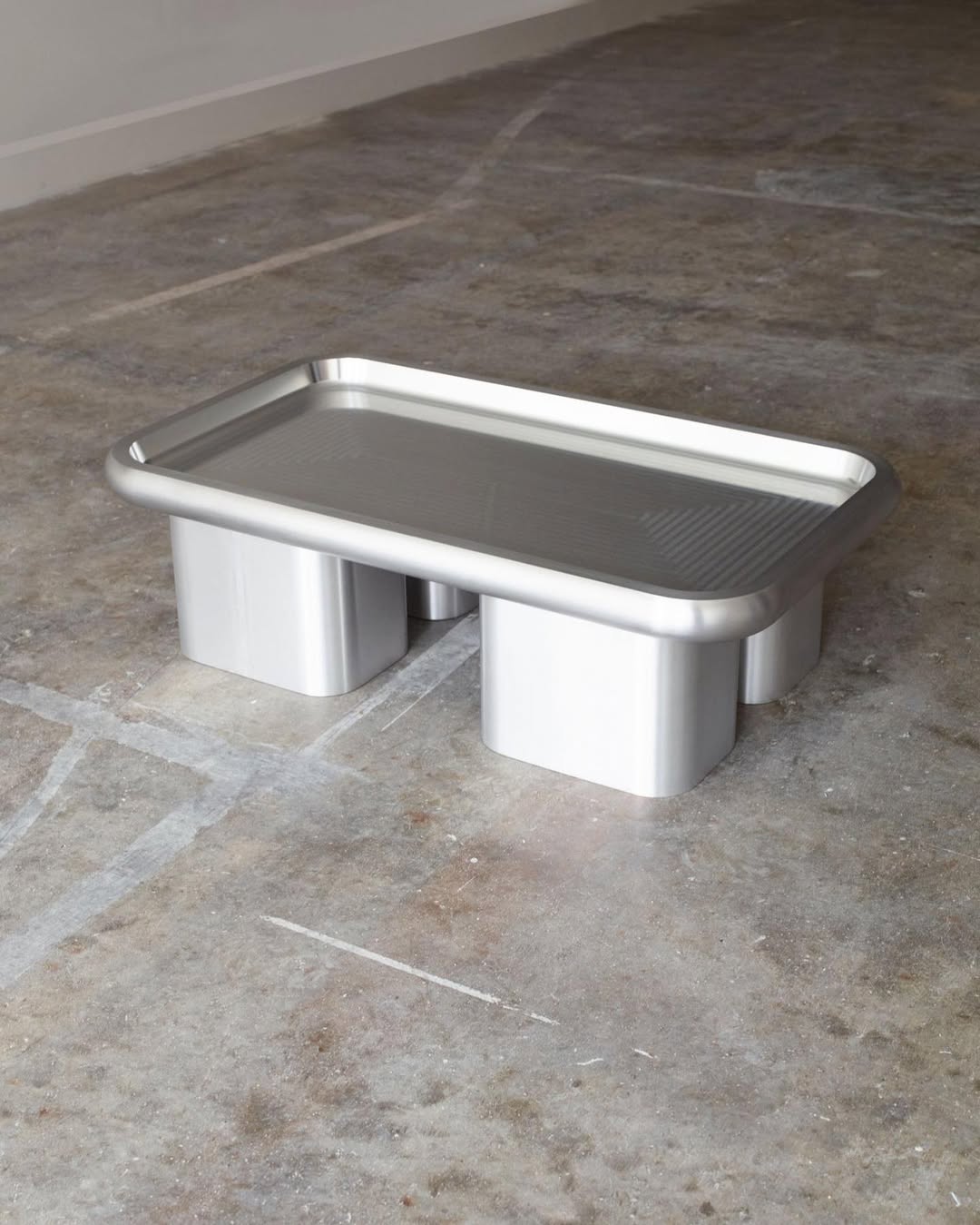 Low metal table by Eddie Olin