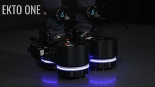The Ekto One VR boots being worn by a VR headset user