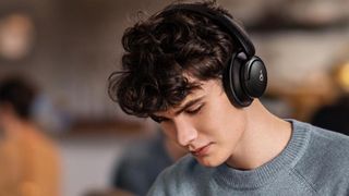 Man wearing Anker Soundcore Life Q30 headphones.