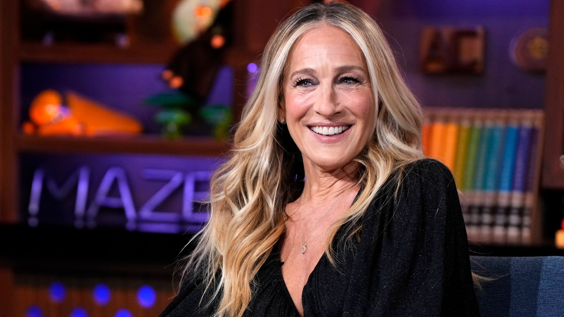 a white woman with long, blonde hair pictured on a talk show set