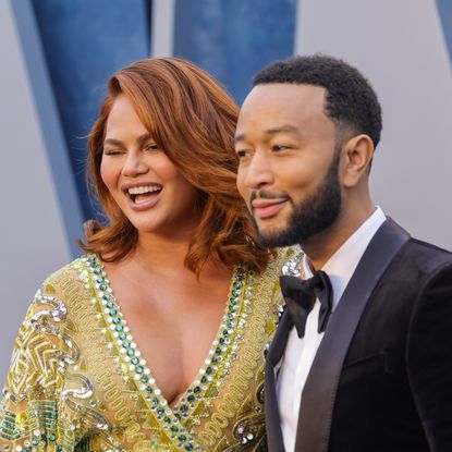 Chrissy Teigen and John Legend at an event