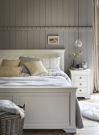 grey country bedroom with shiplap paneling