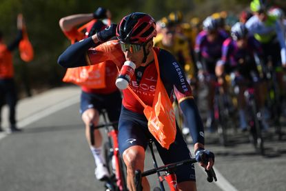 Ineos Grenadiers rider carrying a musette in a stage of the Tour de France