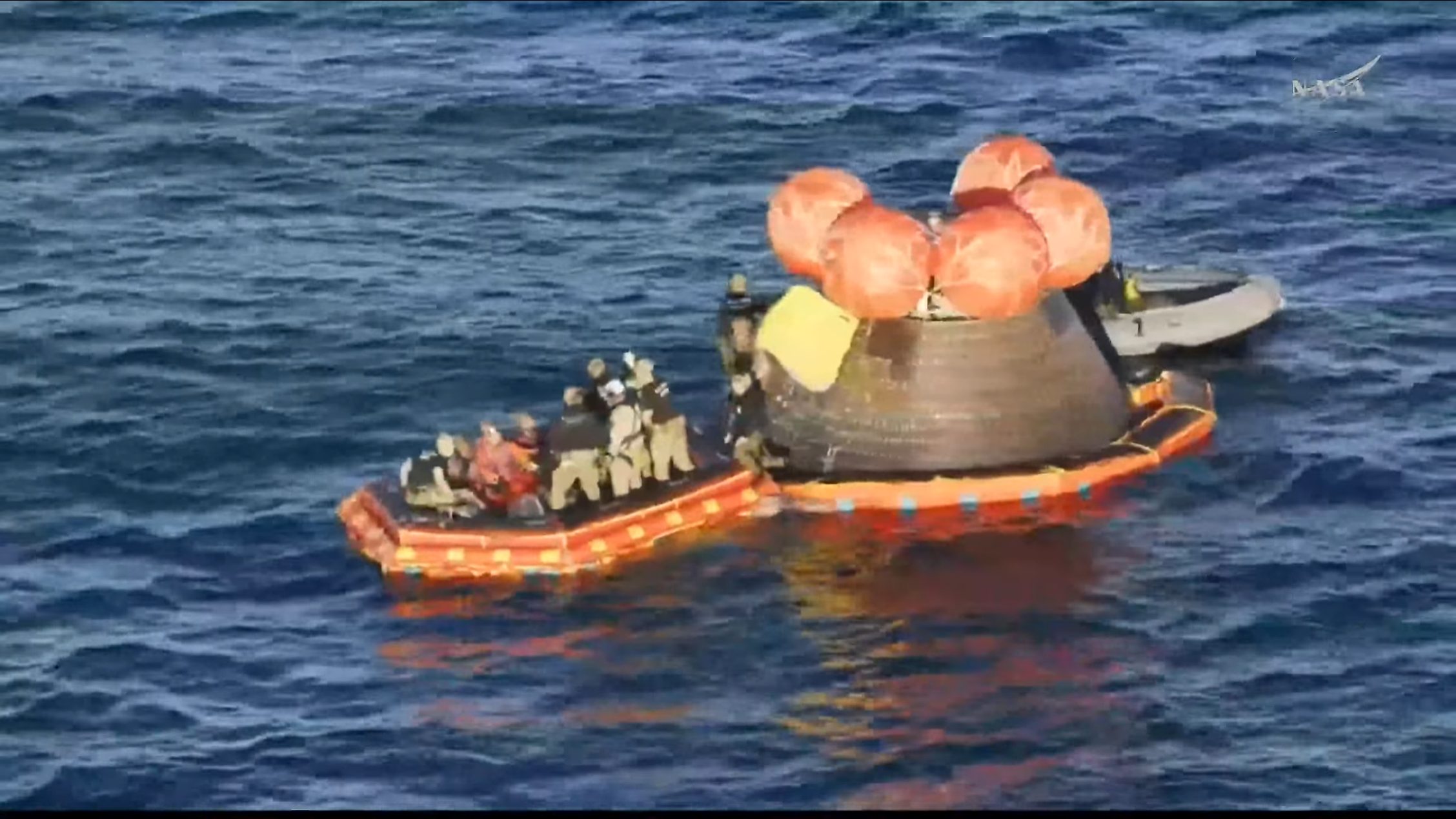 Artemis II crew out of Orion.