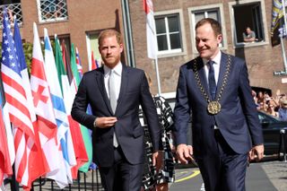 Prince Harry and Stephen Keller, Mayor of Düsseldorf arrive at the city reception at town hall during the Invictus Games Düsseldorf