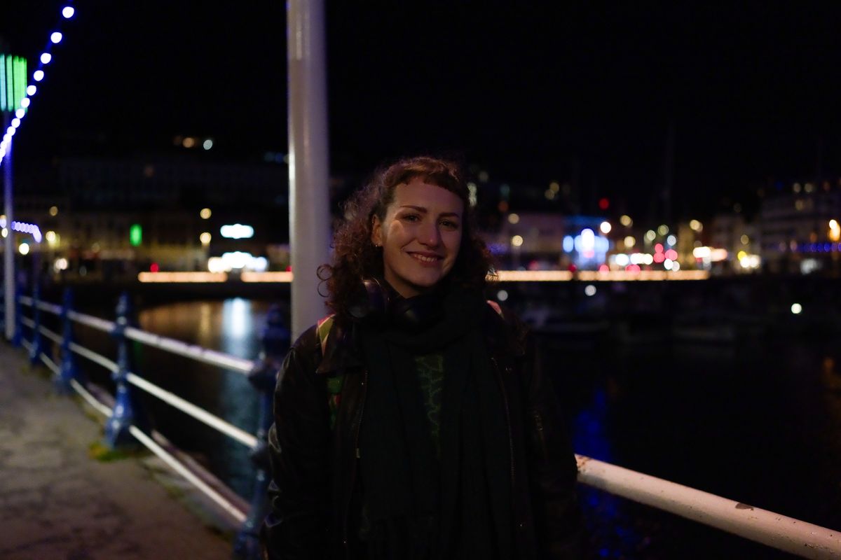 A photo of a woman smiling, taken on a Sigma BF camera